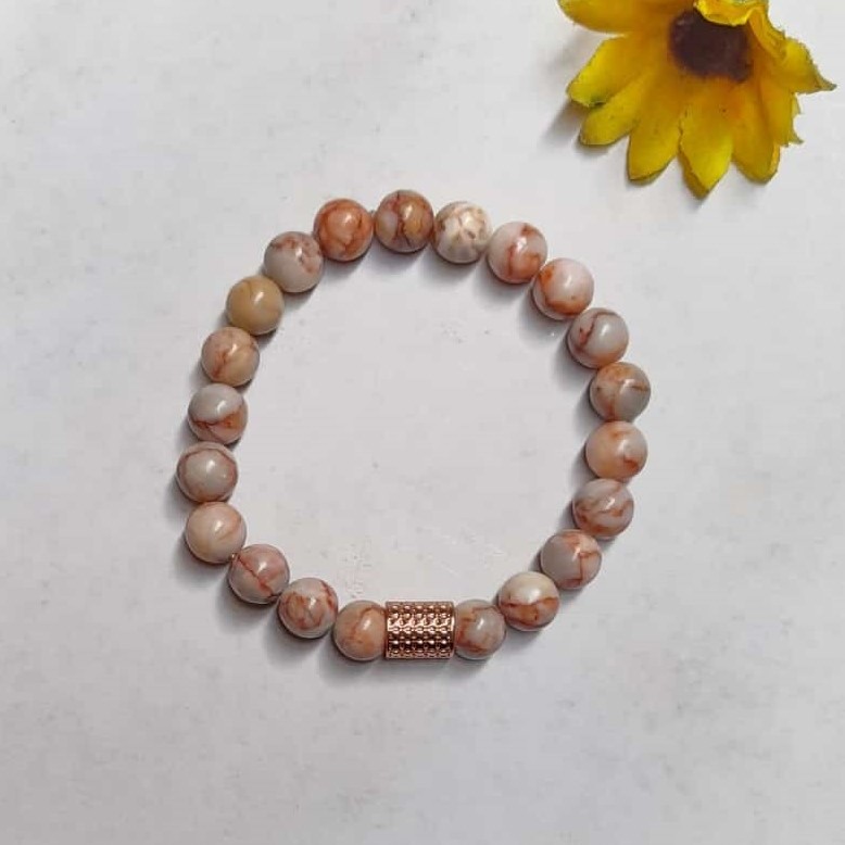Marble agate beads bracelet with rose gold, barrel charm detail.