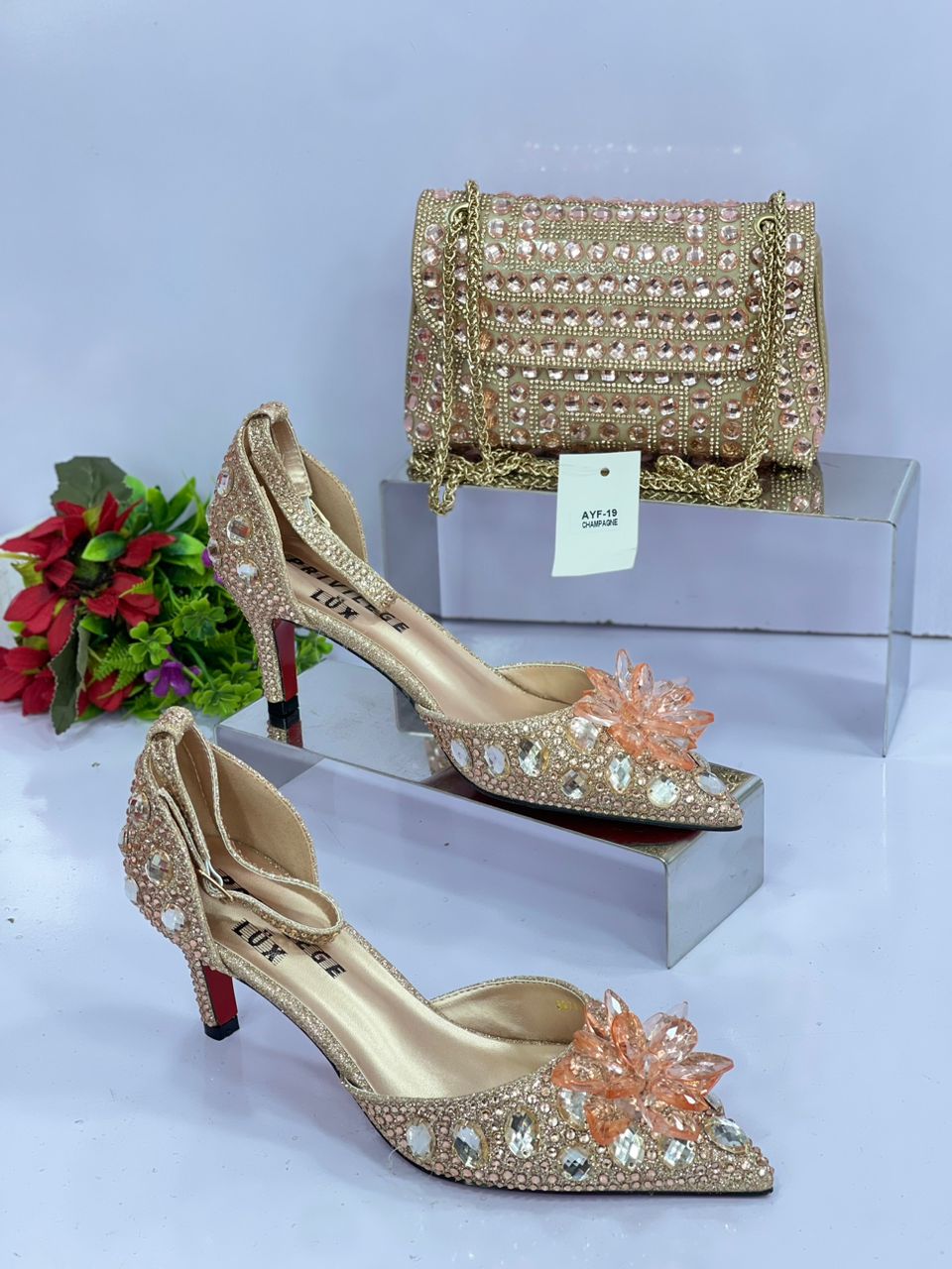 Banner showcases a pair of high heels and a matching clutch, spotlighted  against a velvet curtain backdrop. Generative AI 30200906 Stock Photo at  Vecteezy